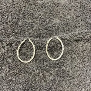 Silver hoop earrings with rhinestones